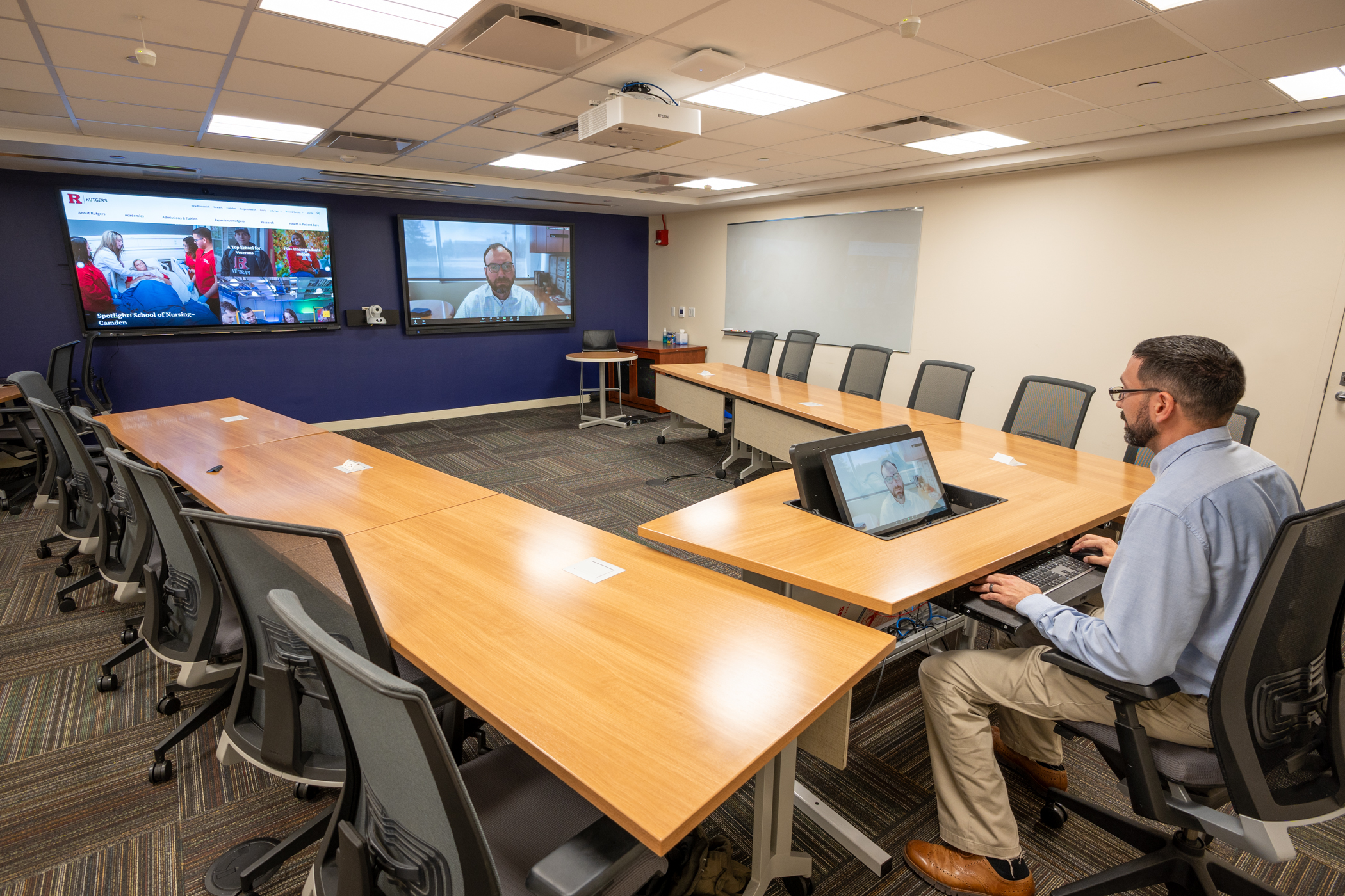 David Wyrtzen and Patrick Auletto working in DCS training center.