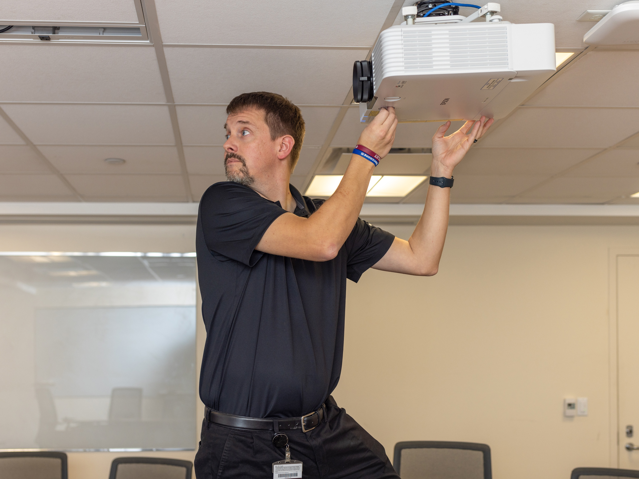 Tim Van Woeart working on a data projector